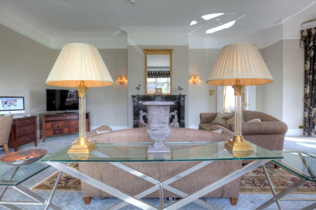 Deluxe King Suite with Four Poster Bed,781066878:JPEG